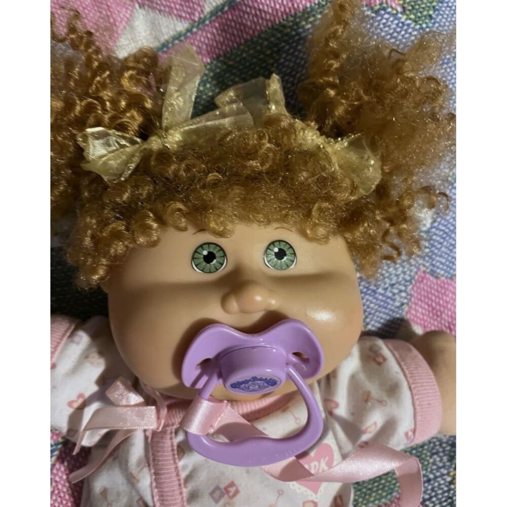 2004 Cabbage Patch Kid with Curly Hair, Green Eyes, and a Pacifier
